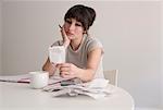 Woman reviewing receipts