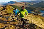 Men hiking on rocky mountainside