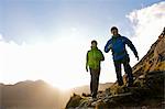Men hiking on rocky mountainside