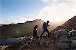 Men hiking on rocky mountainside