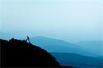 Man hiking on rocky hillside