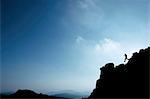 Man hiking on rocky hillside