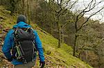 Man hiking on hillside