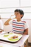 Boy Having Meal