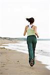 A woman jogging, Skane, Sweden.