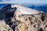 Climbers on summit of Pico de Aneto, at 3404m the highest peak in the Pyrenees, Spain, Europe