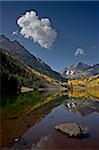 Maroon Bells reflected in Maroon Lake with fall color, White River National Forest, Colorado, United States of America, North America