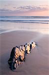 Rock and sand at sunset, Sandymouth Bay, Cornwall, England, United Kingdom, Europe