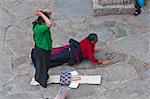 Pilgrims praying before the Jokhang Temple in Lhasa, Tibet, China, Asia