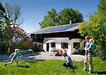 Family at home with solar panel