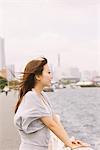 Japanese Women Standing Near Waterfront