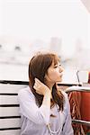 Japanese Women Sitting On Boat