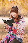 Japanese Women Reading Book Outdoors