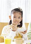 Girl eating chirashi sushi