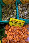 Marseille, Provence, France; Fresh Royal Shrimps for sale in the fish market amidst other seafood