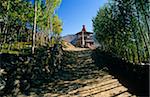 Nepal, Himalaya, Mustang. A chorten, or Buddhist shrine, guards the main trail near Chhunggar hamlet and the Nyi Pass.