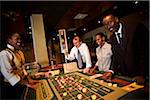 Kigali, Rwanda. Gamblers try thier luck at kigalis Top Tower casino.