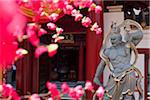 Singapore, Singapore, Chinatown.  Guardian statue at the Buddha Tooth Relic Temple and Museum.