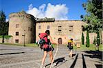 Way of St. James's pilgrims arriving at Villafranca del Bierzo. Castilla y Leon, Spain