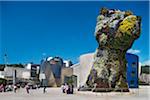 Guggenheim Museum, architect Frank O. Gehry, flower dog by Jeff Koons, Bilbao, Basque Country, Spain