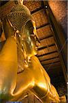 Thailand, Bangkok.  Reclining Buddha statue at Wat Pho.