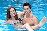 Couple dans la piscine, l'hôtel Reef Playacar Resort et Spa, Playa del Carmen, Mexique