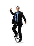 Businessman Riding Unicycle and Pumping Fist