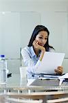 Businesswoman reading document