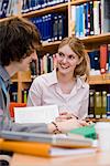 Two students in a library, Sweden.