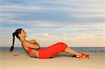 Woman exercising, smiling