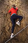 Woman crawling on ground