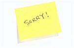 Sticky post it note with "Sorry" wording.