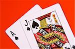 Black Jack and Black Ace in the red background.
