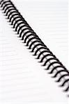 Close up of spiral note book, only focus on the center.