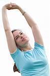 Woman stretching up her hands during fitness exercise