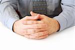 Closeup of businessman's hands on white background