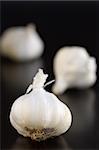 Fresh Garlic on a dark wooden table