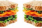 Big healthy sandwich with vegetables and meat close up on white background