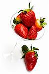 Strawberry in glass isolated on white background