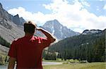 Day hiker catching a glimpse of Whitetail Peak, Montana.