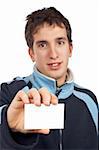 Handsome teenager showing a blank card. Card on focus