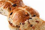 traditional hot cross buns whole and sliced close-up