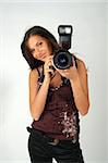 Girl - photographer with pro camera in hands