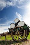 Old Cart Holding Wine Barrels on a farm