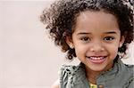 Cute little girl doing fashion photo shoot in a mountains