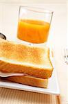 Sandwich, cup of coffee and fresh squeezed orange juice for breakfast. Shallow DOF