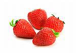 four delicious strawberries on white background