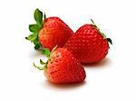 three fresh strawberries on white background