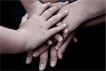 Hands of a whole family (father, mother, one boy and two daughters).