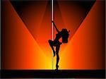 Silhouette of a sexy pole dancer